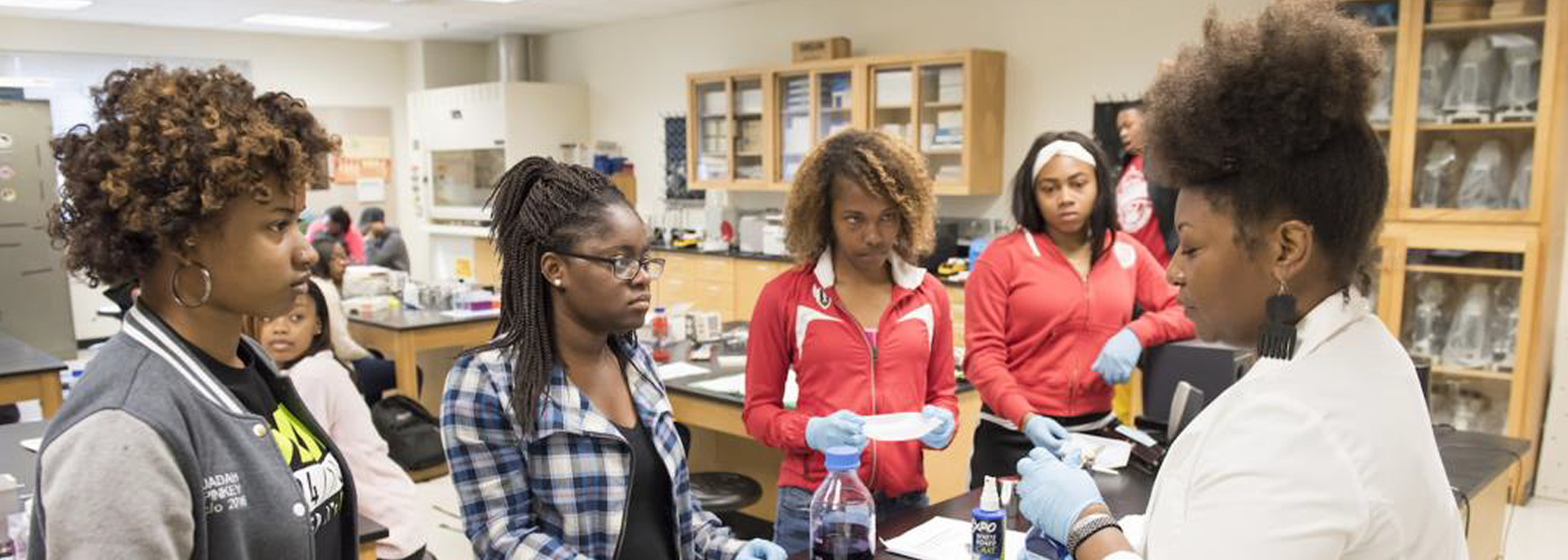 Students and professor in lab